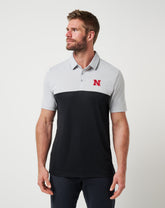 Nebraska Drop Back Polo| Travis Mathew