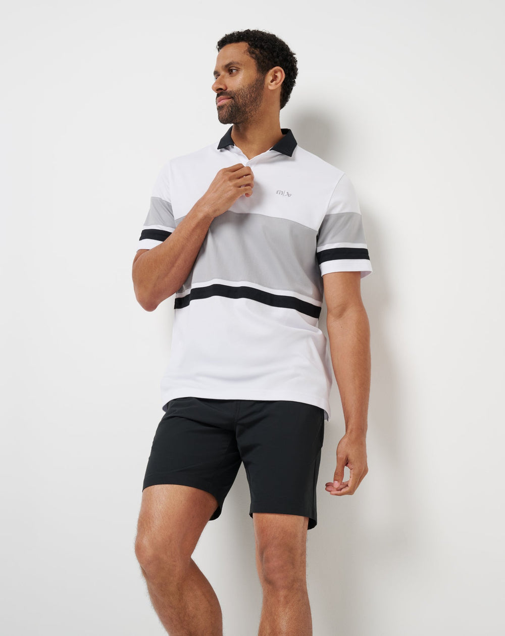 Body Check Polo| Travis Mathew