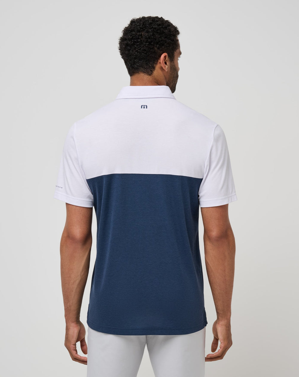 Auburn Drop Back Polo| Travis Mathew