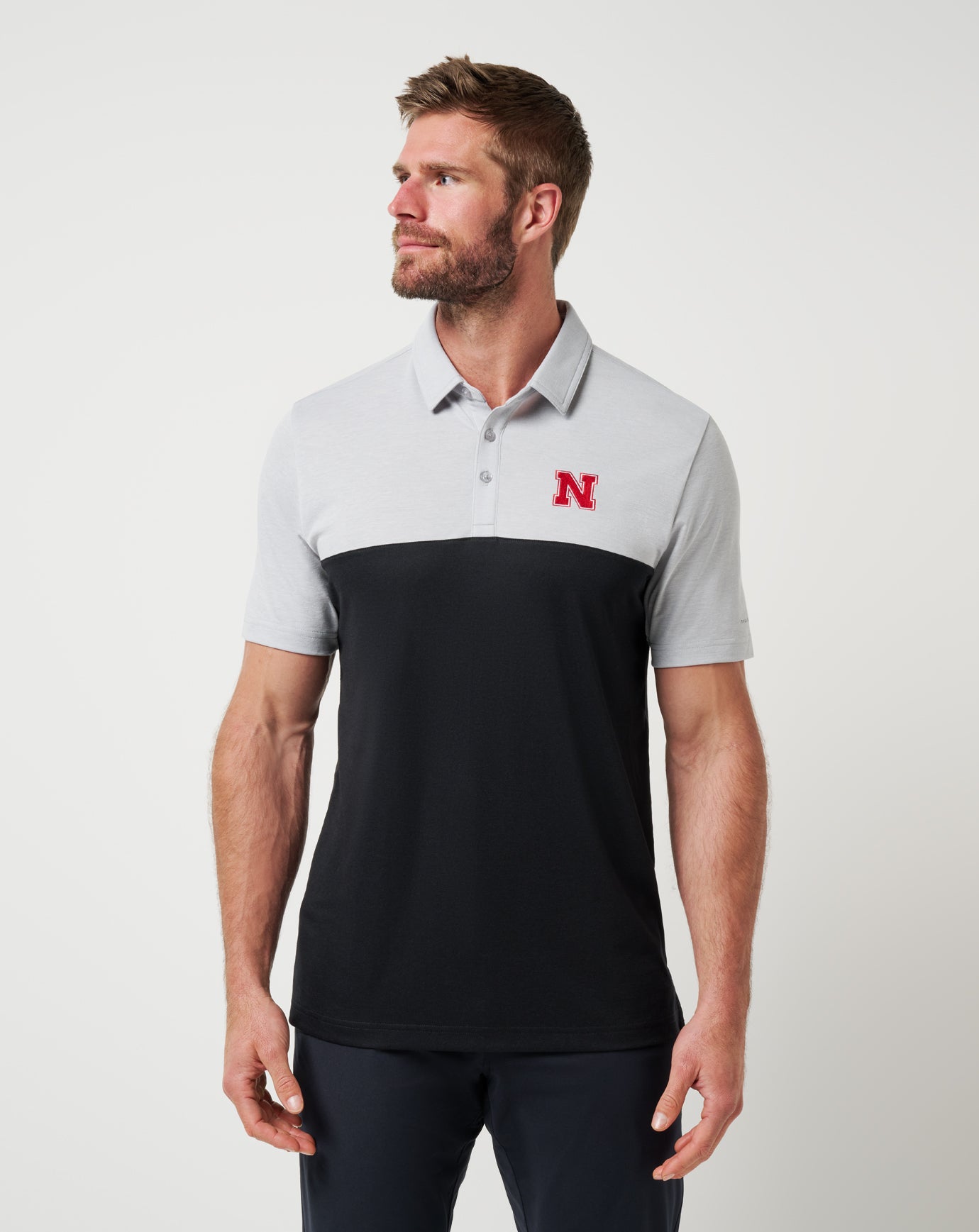 Nebraska Drop Back Polo| Travis Mathew
