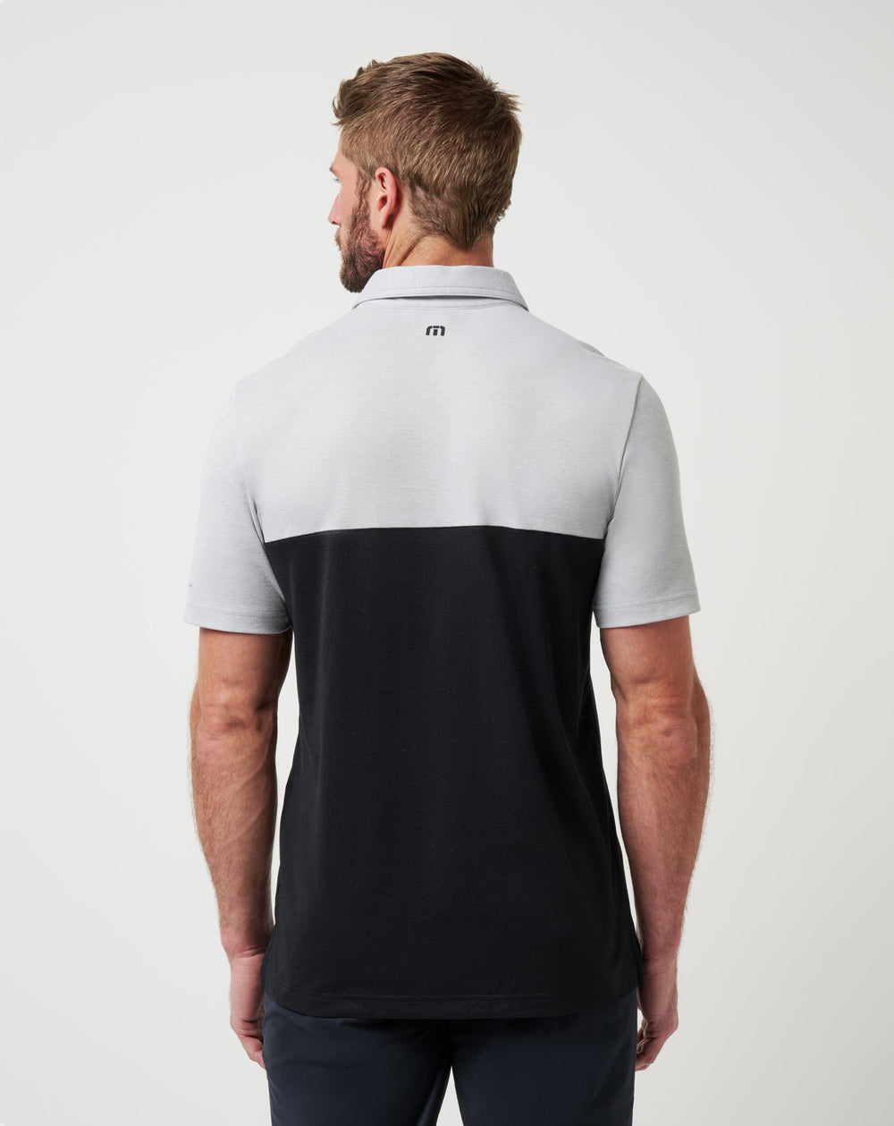 Nebraska Drop Back Polo| Travis Mathew