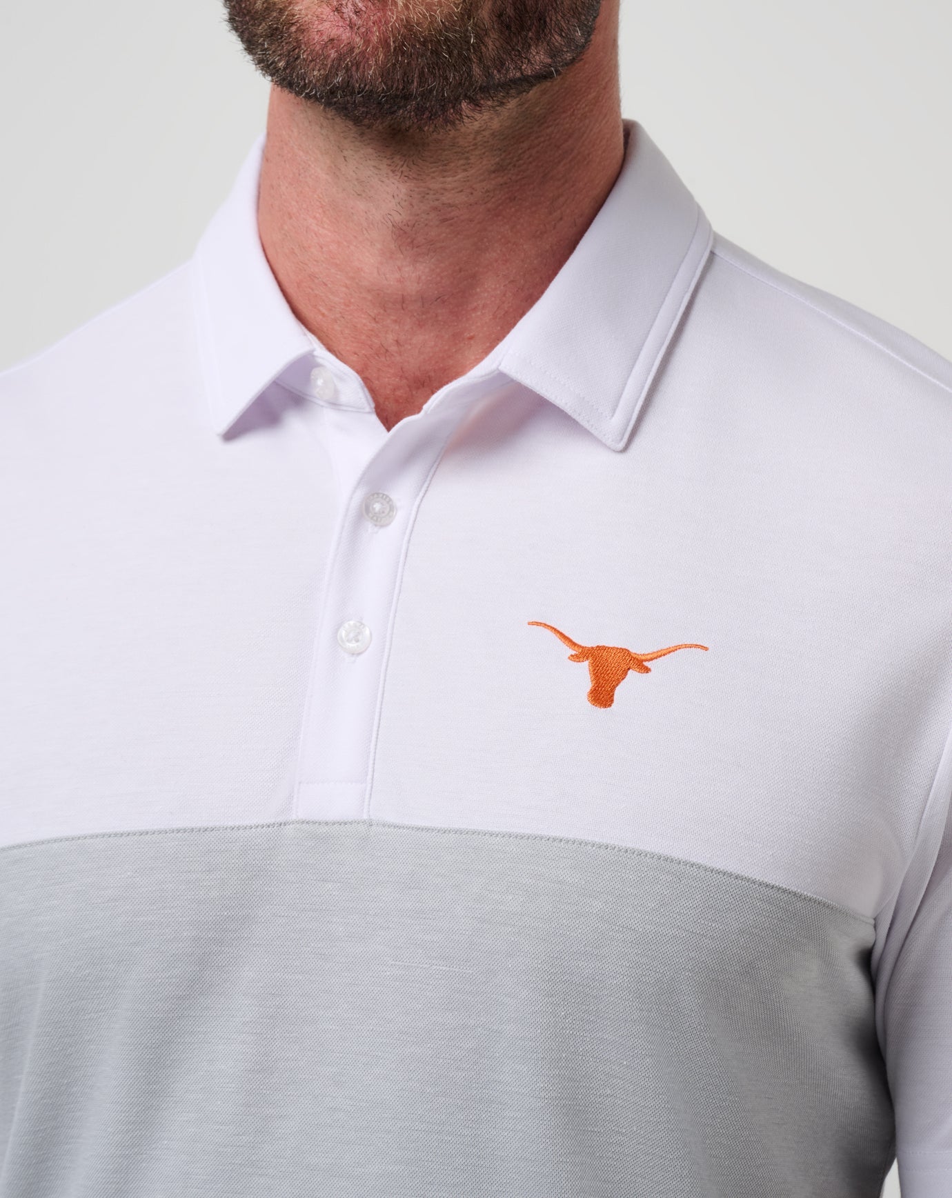 UT Austin Drop Back Polo| Travis Mathew