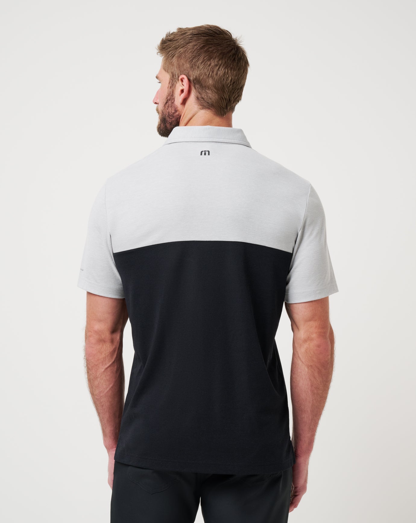 UT Austin Drop Back Polo| Travis Mathew