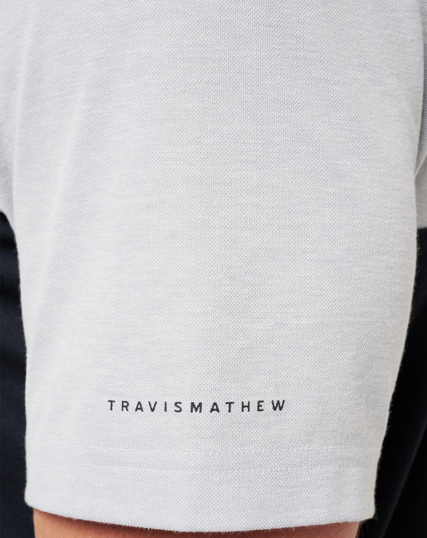 UT Austin Drop Back Polo| Travis Mathew
